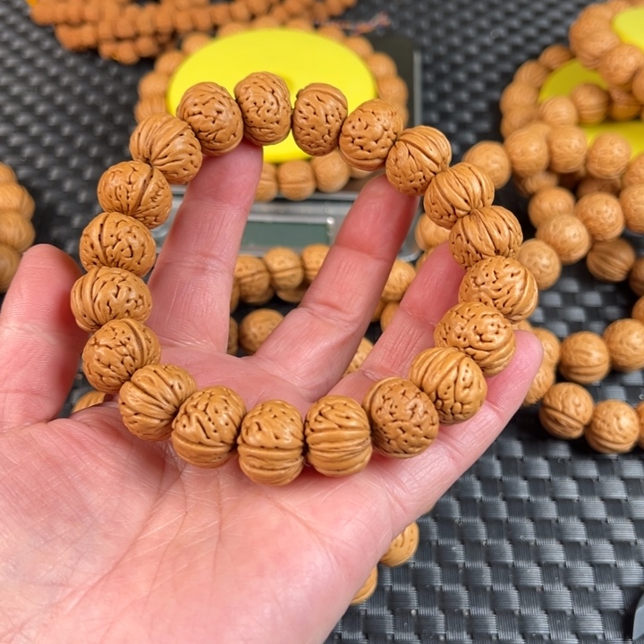 1***3手串桃核树王纽扣