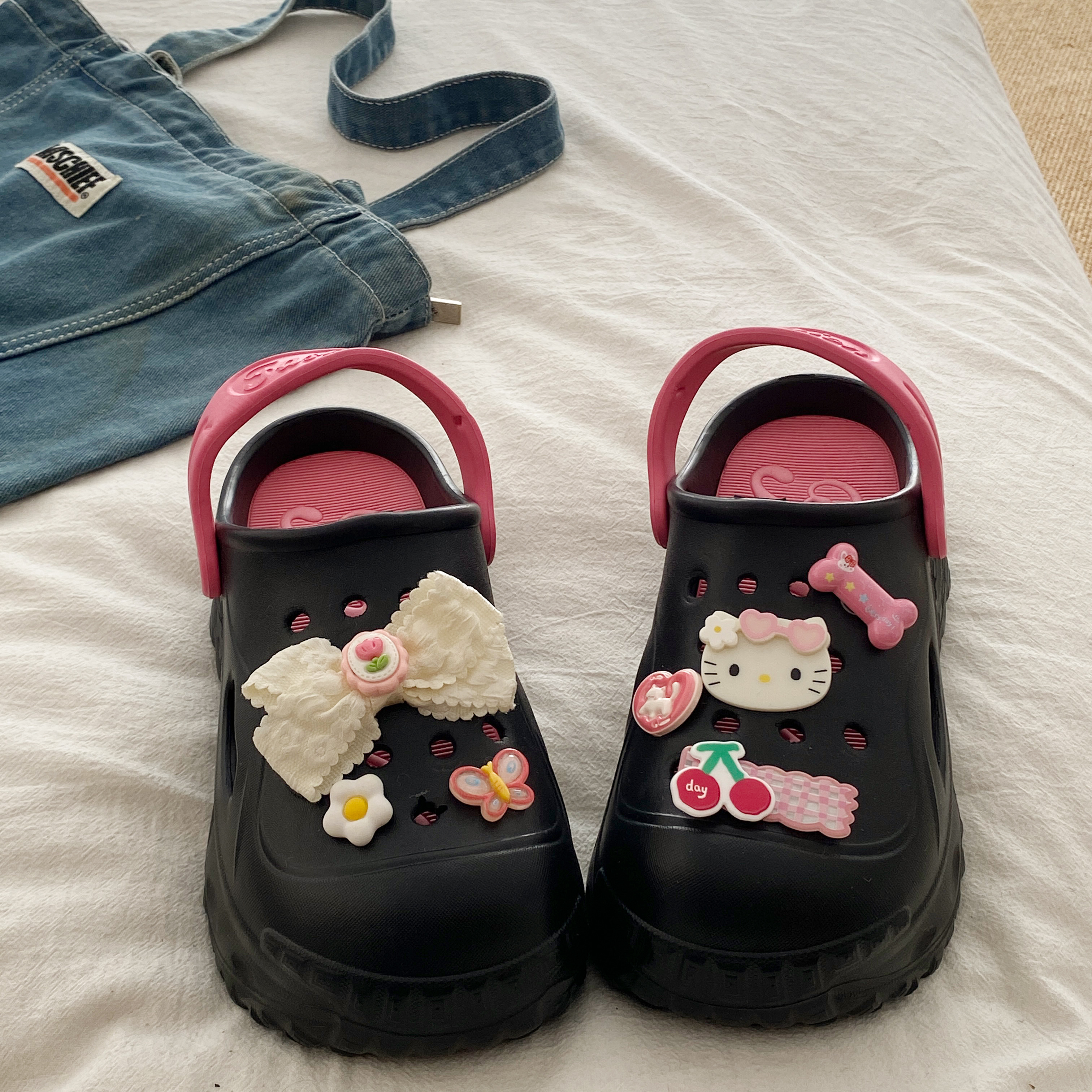 蝴蝶结小猫洞洞鞋女2025夏季外穿沙滩踩屎感EVA防滑不臭包头凉拖