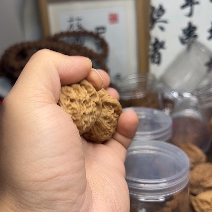 诗***锦桃核吊坠白狮子核桃