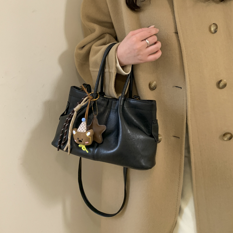 LOMMINY/罗米尼轻奢时尚通勤手提包单肩斜挎小众设计百搭2025秋冬