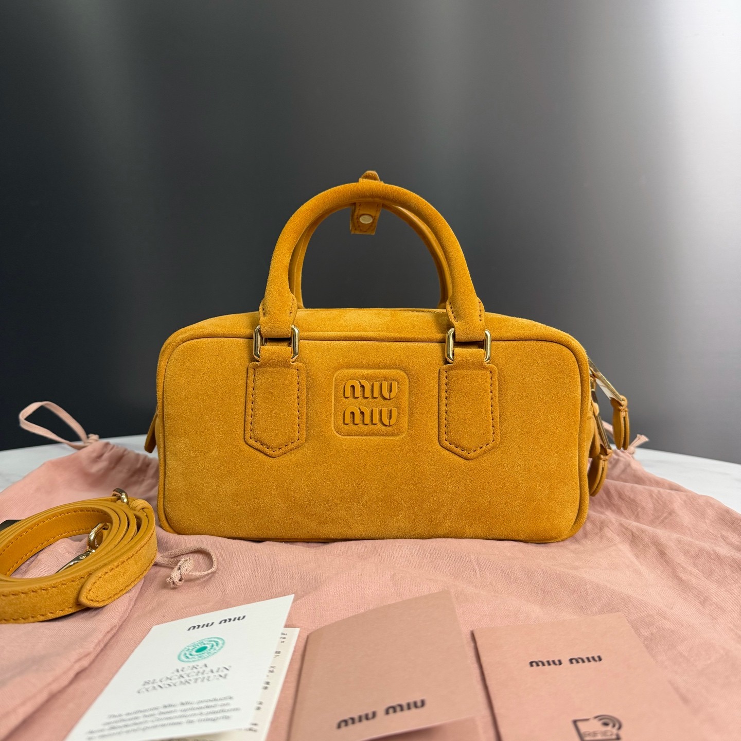 未使用 MIU MIU/缪缪 南瓜色麂皮金扣，保龄球单肩包18002449