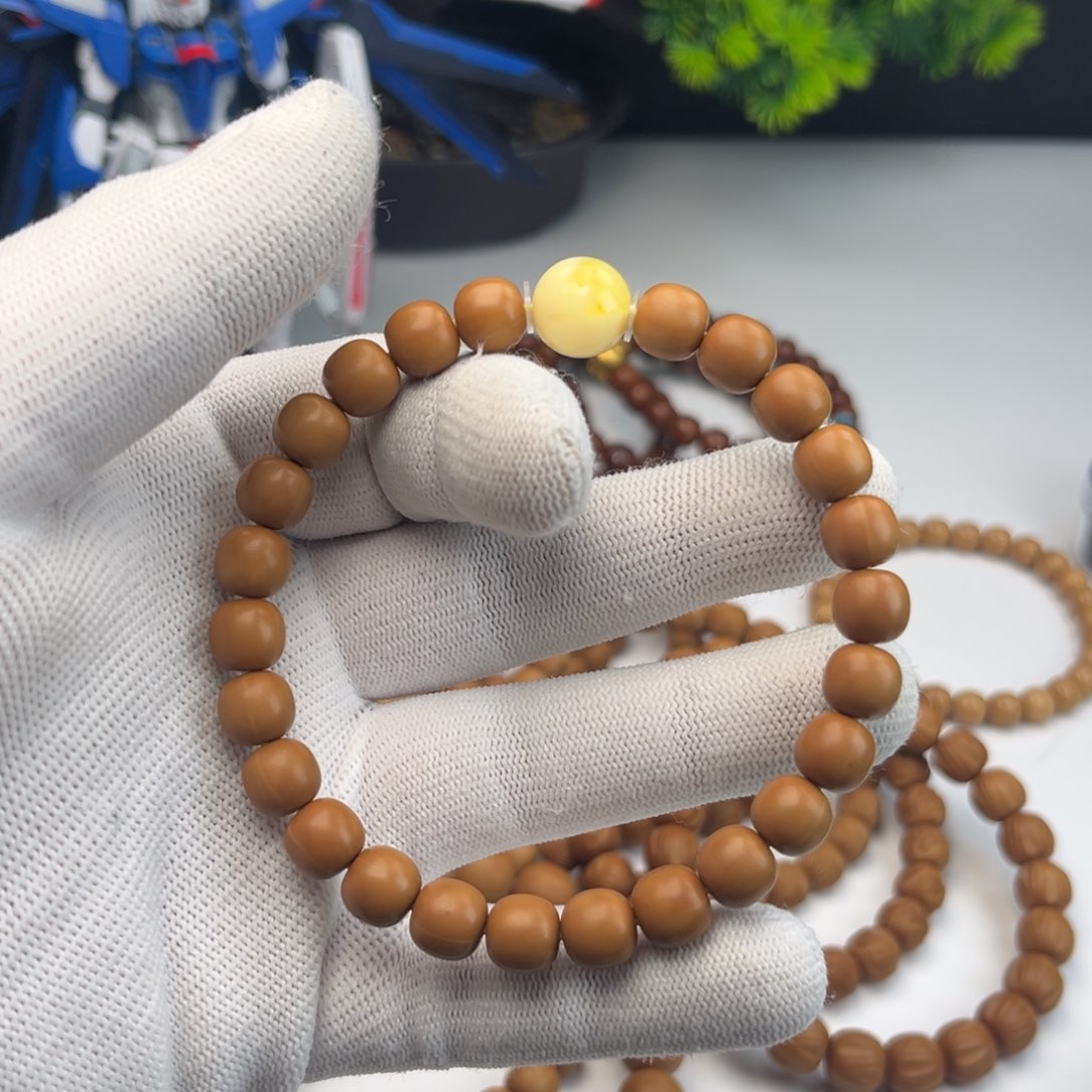 w****龙微瑕原生态猴头手串