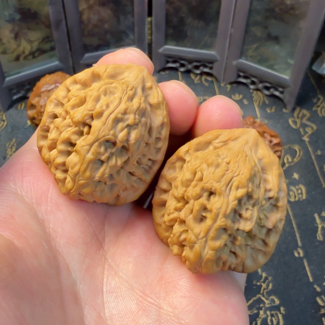 文玩核桃吊坠野核四眼虎头35