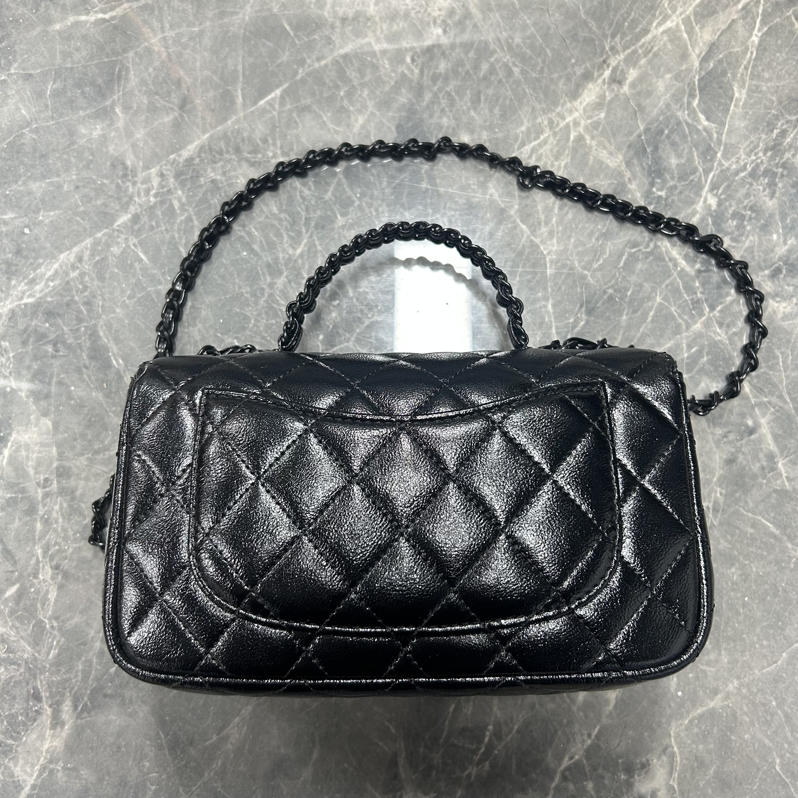 2025新款真皮女包卷手提黑色