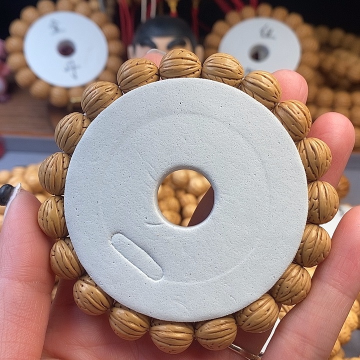 桃核手串凤羽12 （尺寸误差0.5之间）