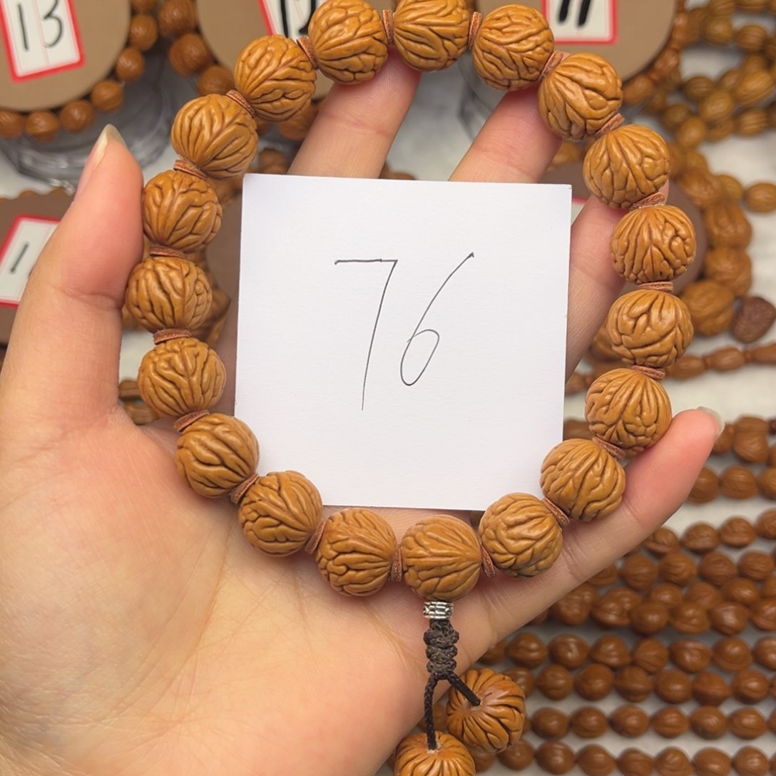 核桃龙纹桃核手持肚卡14柳叶纹