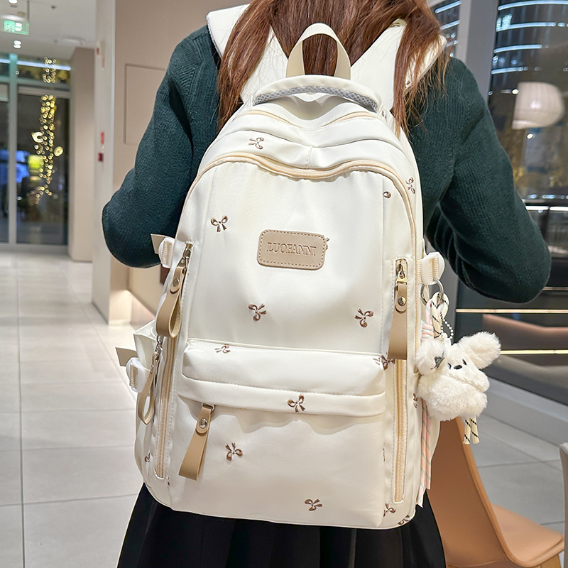 高颜值蝴蝶结双肩包女韩版初中生高中生小学生背包减负轻便双肩包