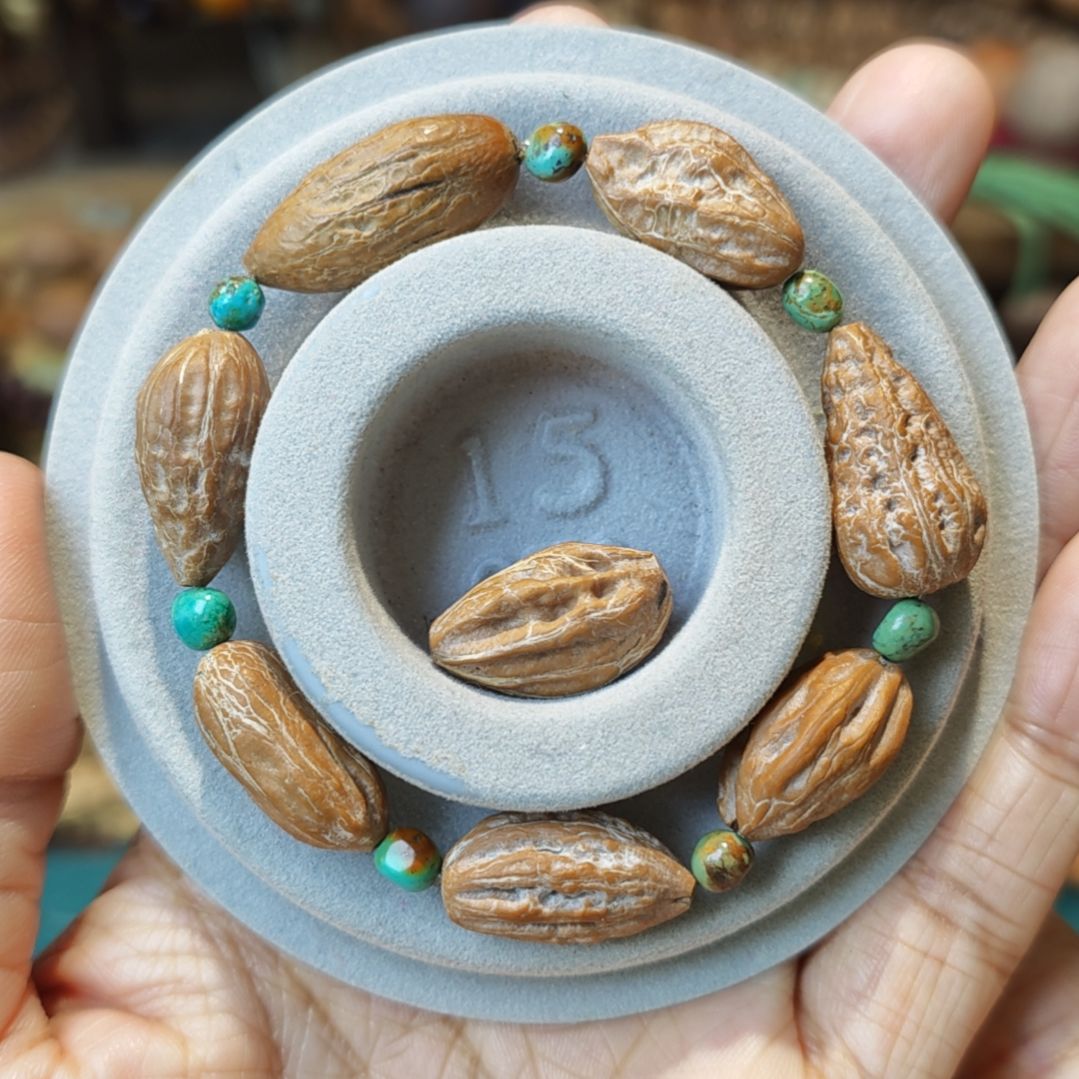 m***t吊坠紫金鼠秋籽手串