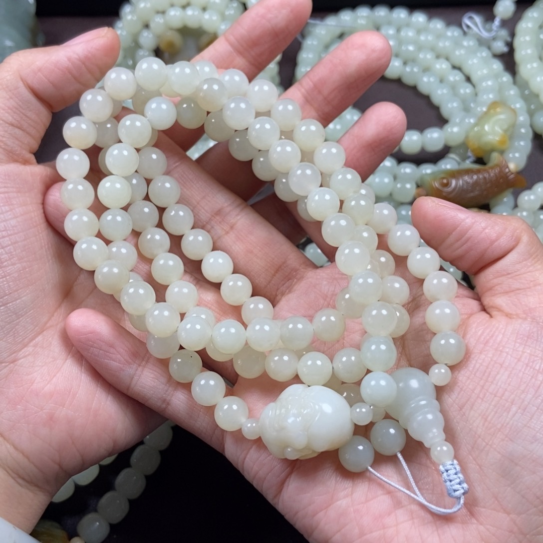 苏***业和田玉未镶嵌把件