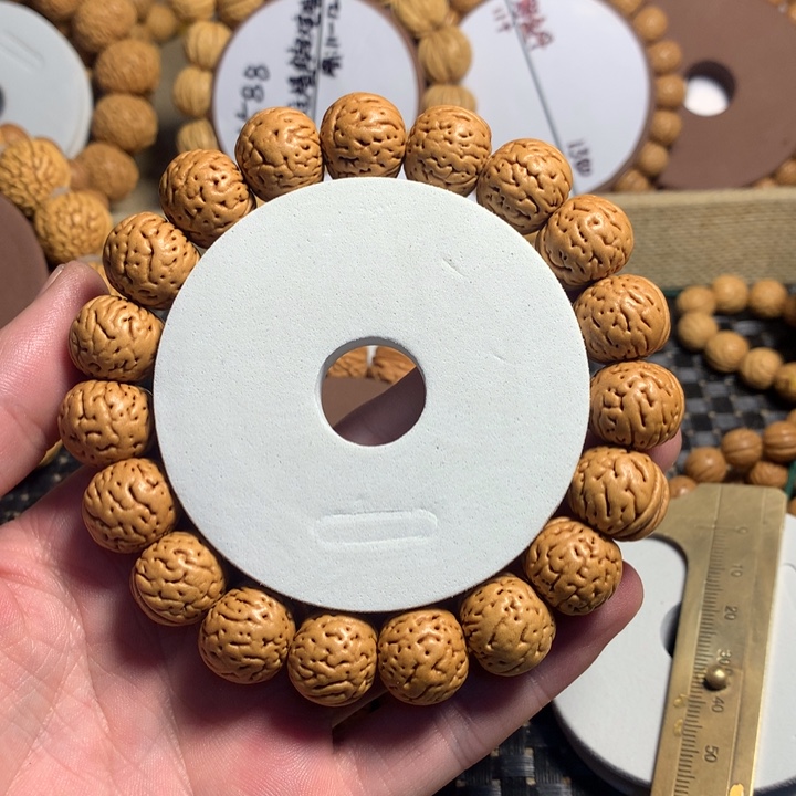 窜***猴手串桃核30#红皮原树金丹