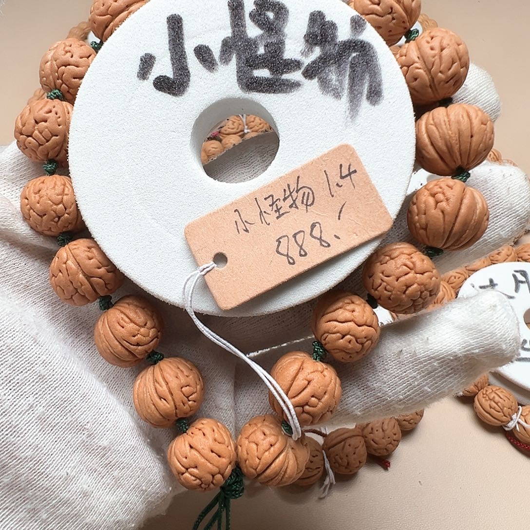 羡***鱼手串桃核1.4小怪物