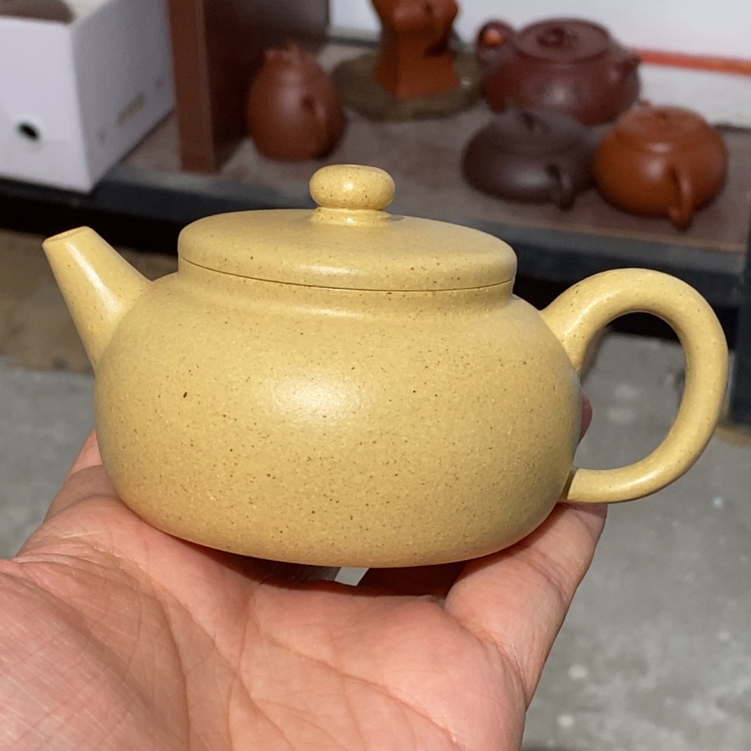 紫砂公道杯紫砂壶。紫砂壶