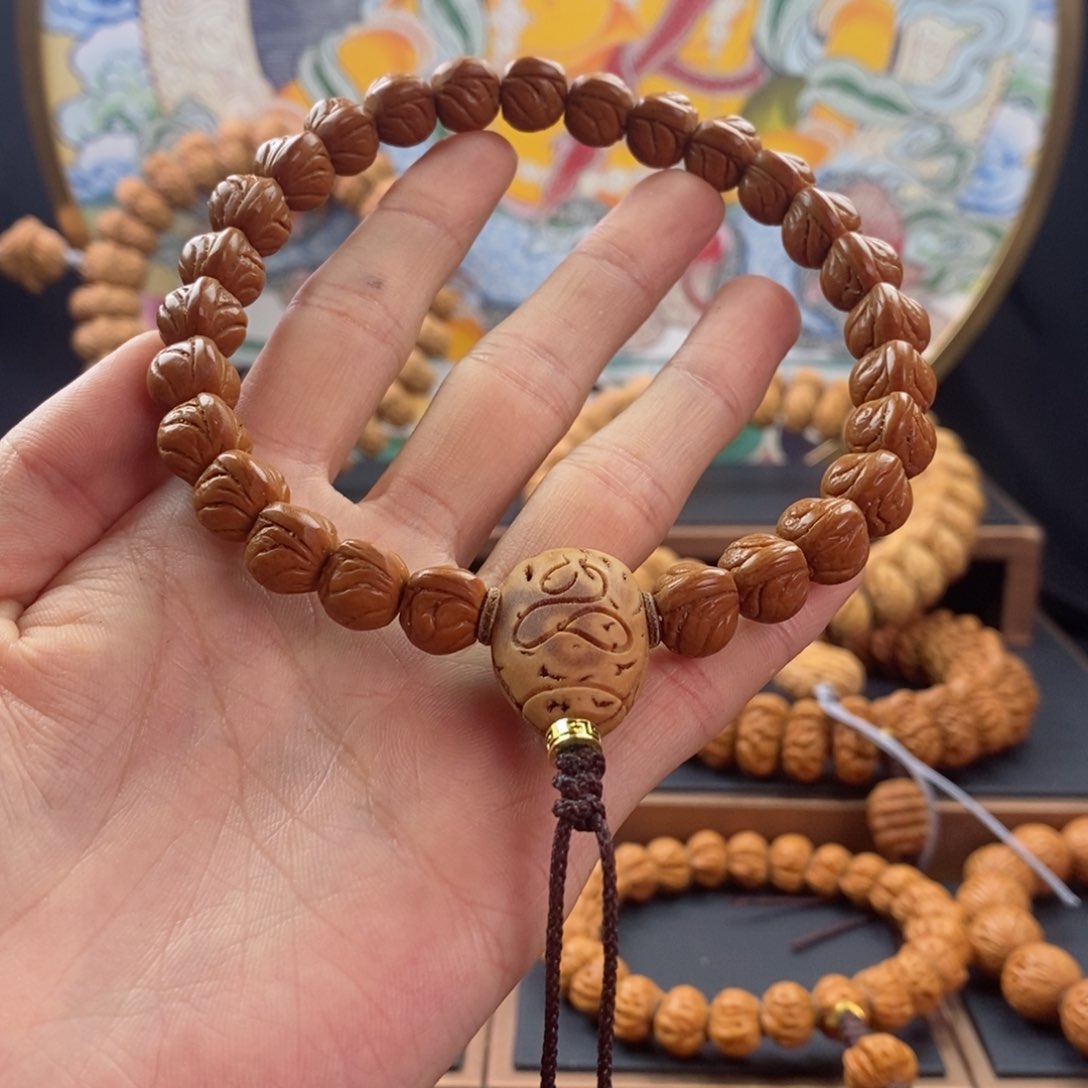 桃核手串?***憩龙纹桃核野生籽