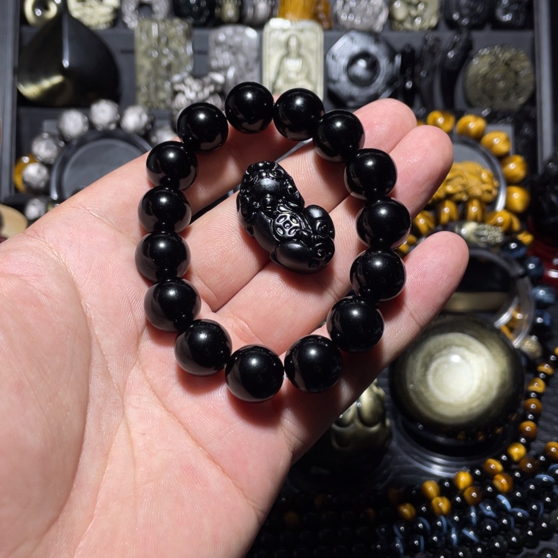 邢***华黑曜岩未镶嵌手链