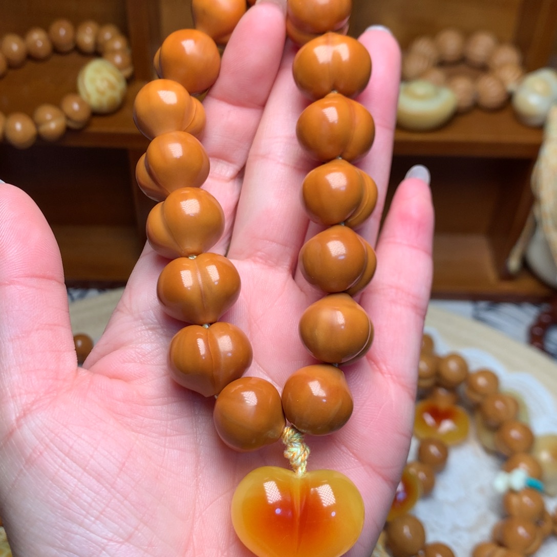 把件猴头核桃17玻璃底屁桃手持爱心