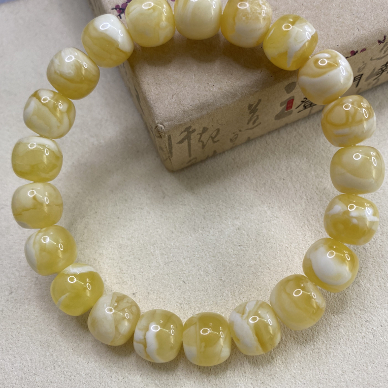 琥珀蜜蜡10.5mm金瓷白腰花16