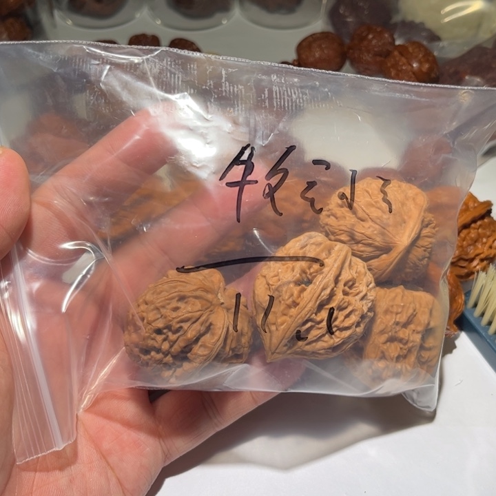 牧***宇桃核把件狮子头核桃