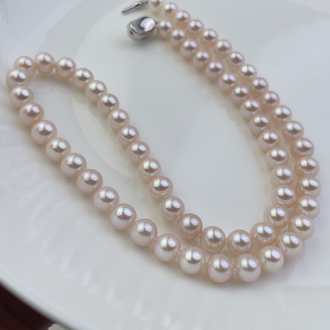 淡水珍珠银S925镶嵌耳饰