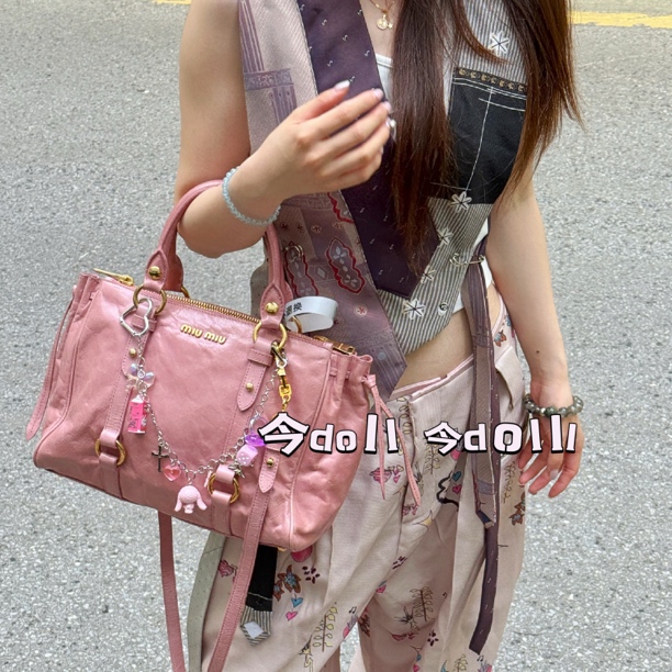 95新 MIU MIU/缪缪 粉色油蜡皮机车蝴蝶结单肩斜挎包 063491