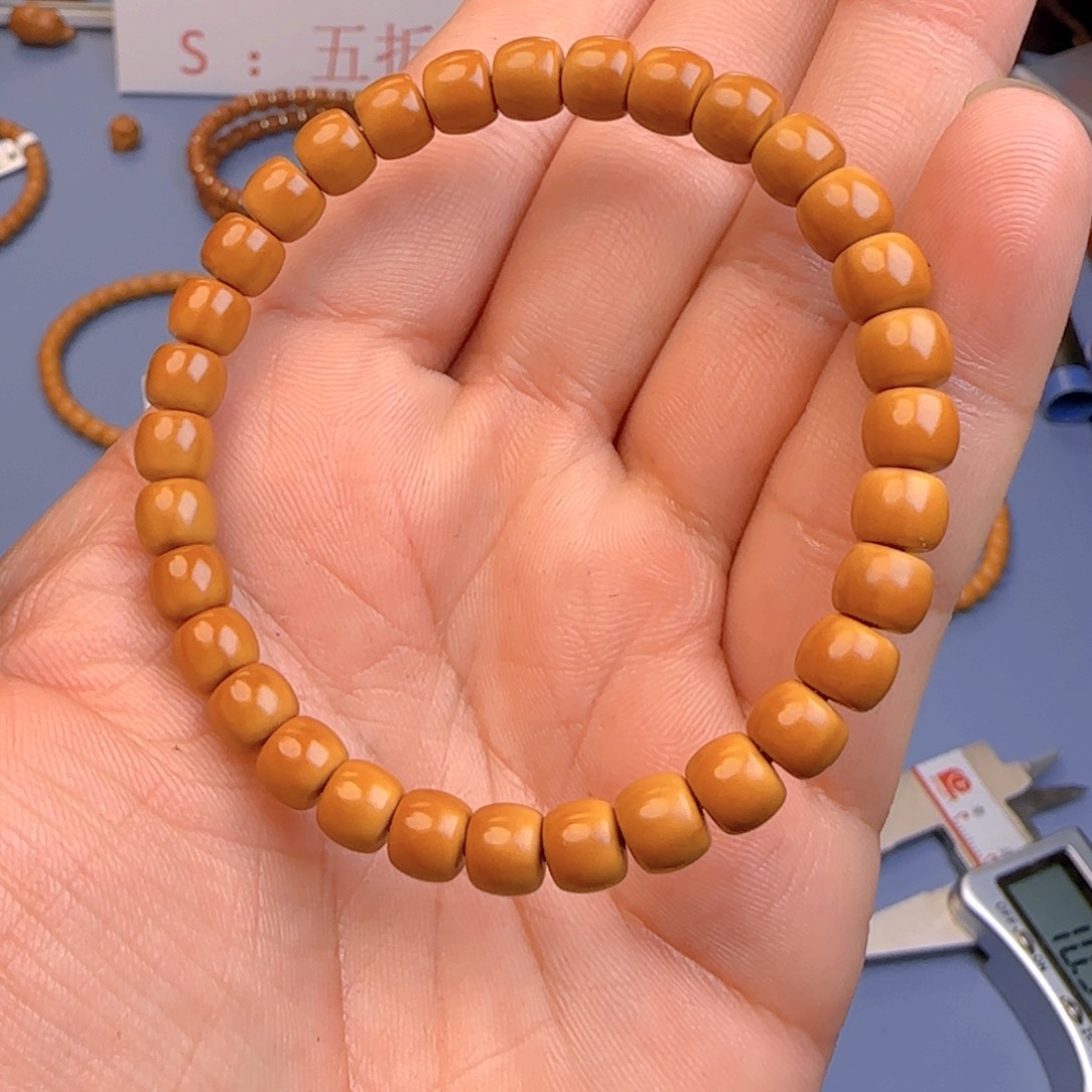 橄榄核手串核尖极限弧尺寸7+ss微变色