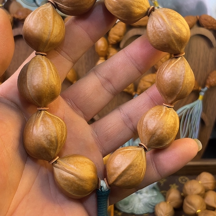 咸***咸橄榄核手串梅林铁2.2