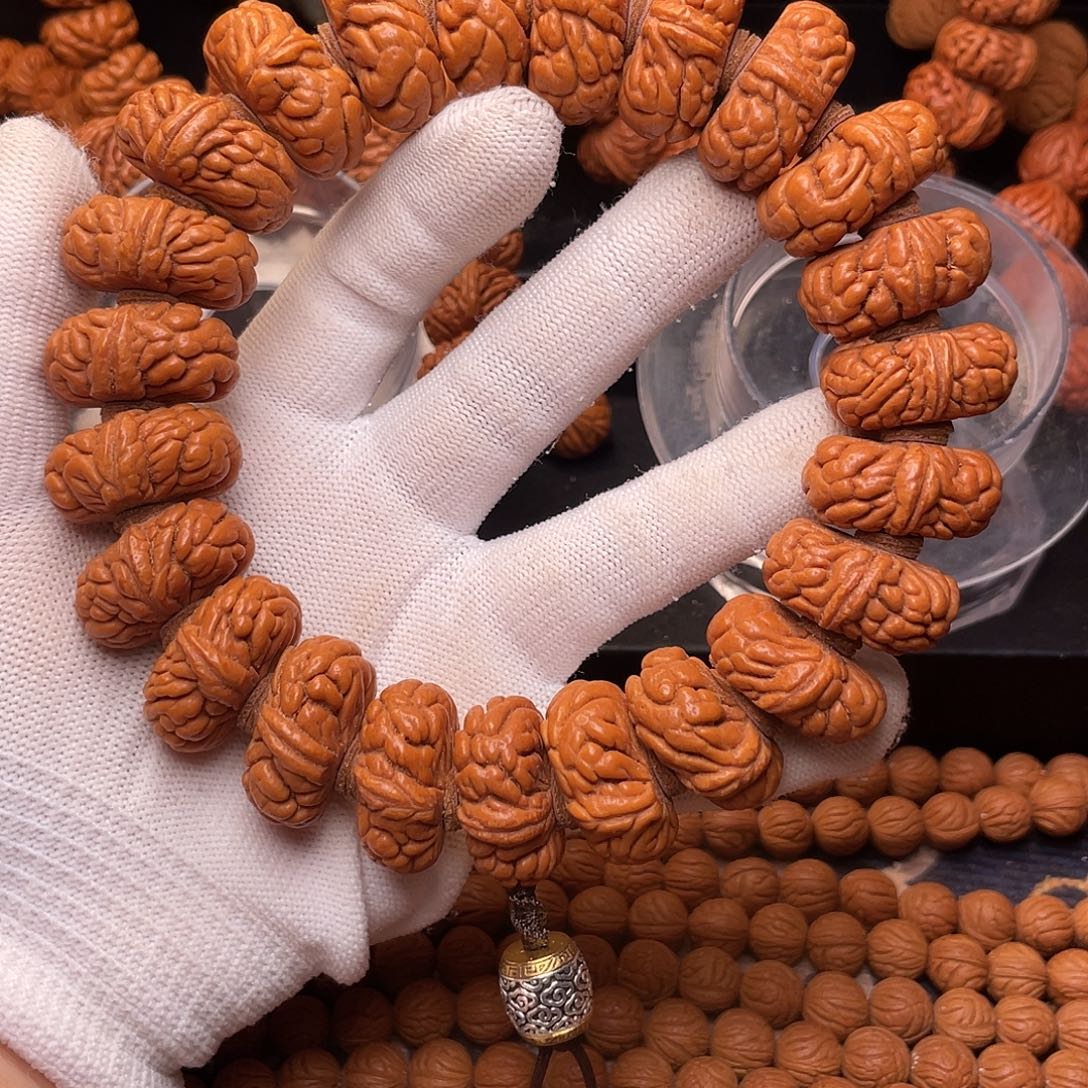 桃核把件霸王龙手持，2