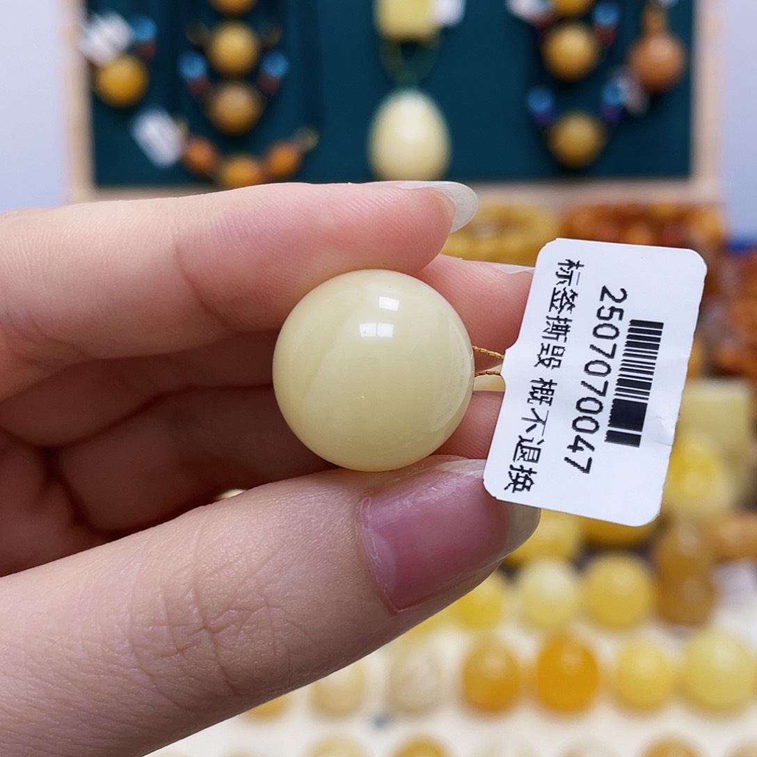 蜜蜡未镶嵌珠宝奇石安****。18mm圆珠