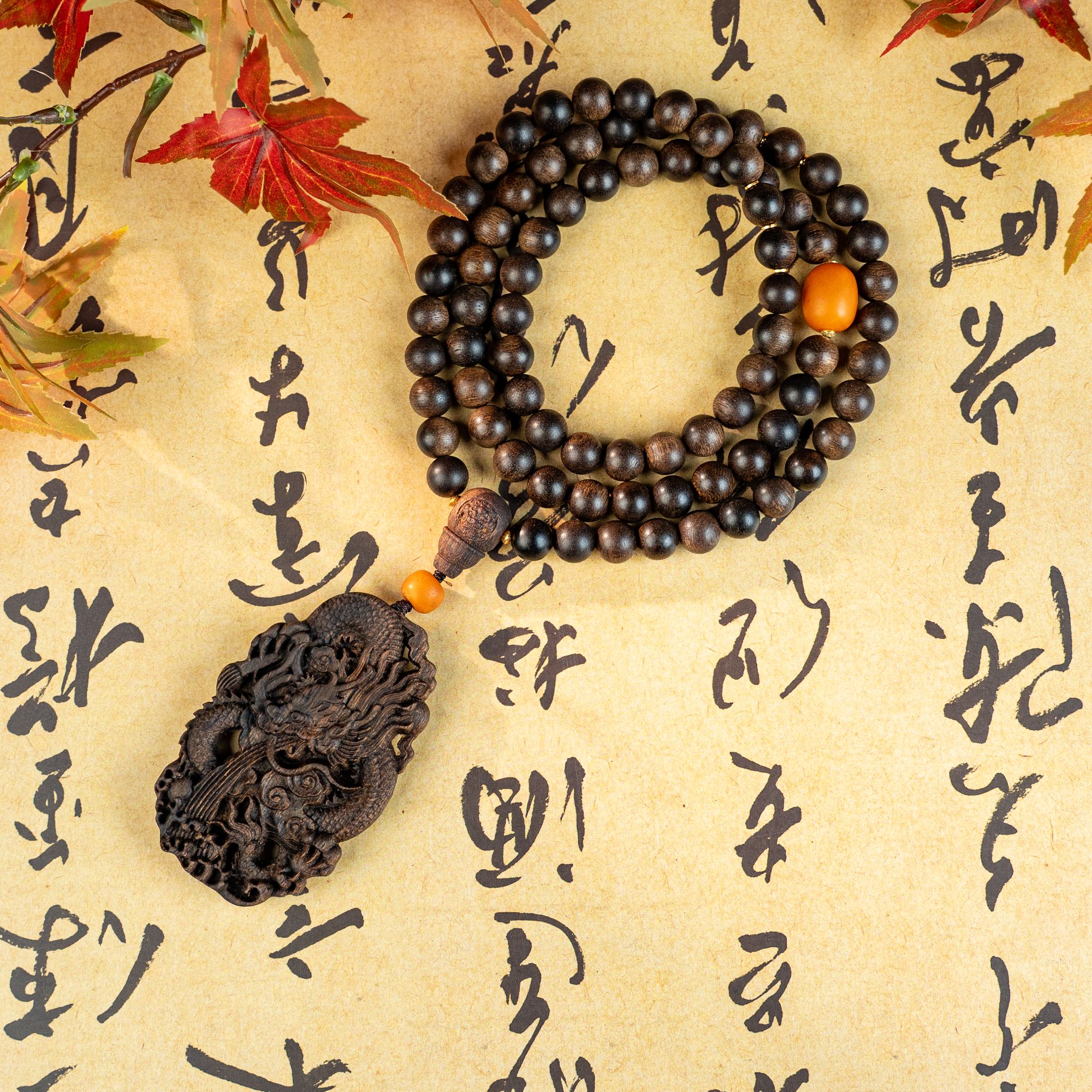 【沉水】海南昆仑梅格雷击树心油老料1.0长串带龙牌挂坠沉香木雕