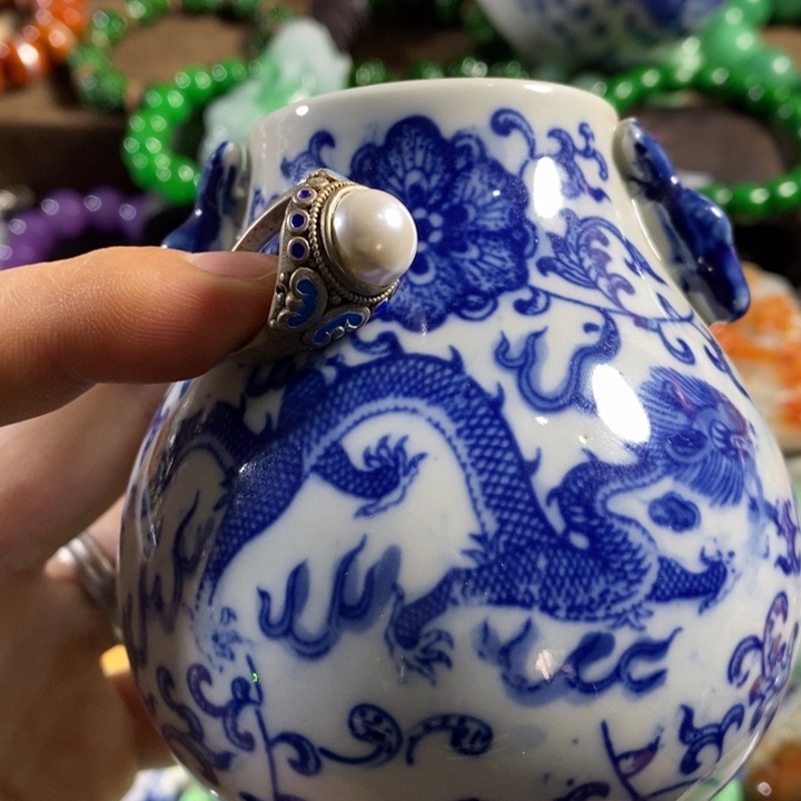 小***人摆件陶精品购物中心的经营