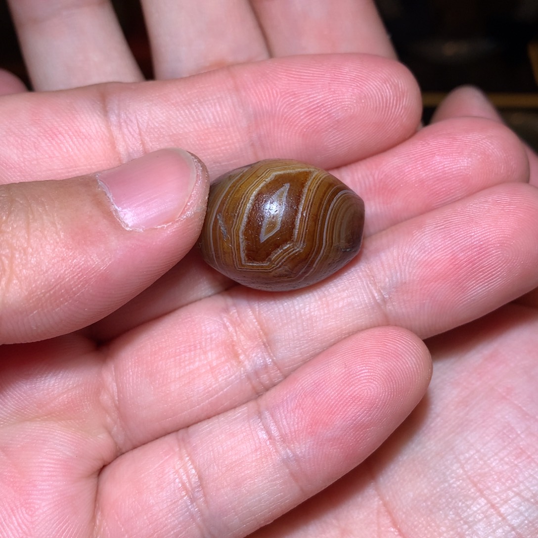 玛瑙/玉髓未镶嵌藏系千年带眼橄榄珠