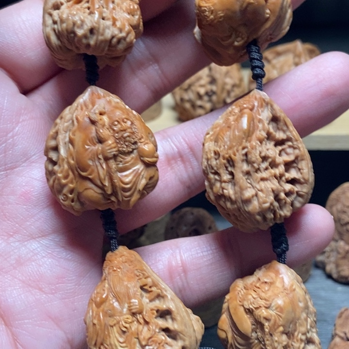 吉****核桃手串/手链风味纯手工核桃雕刻群仙手持