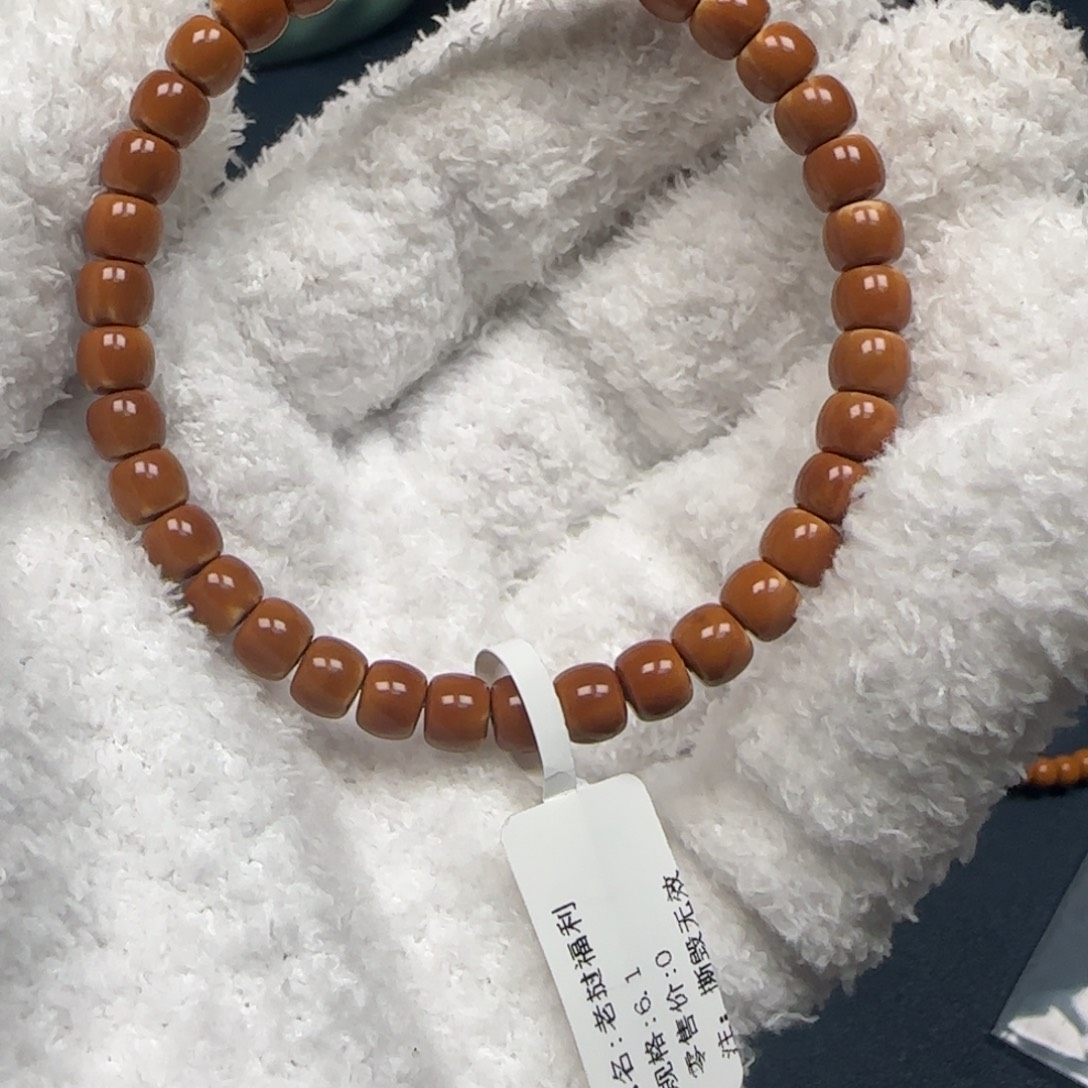 橄榄核手串老挝单圈极限弧三花6.1mm