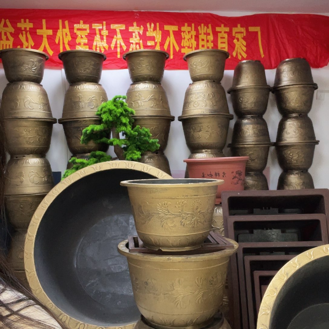 怡***睿60花盆两个都打孔