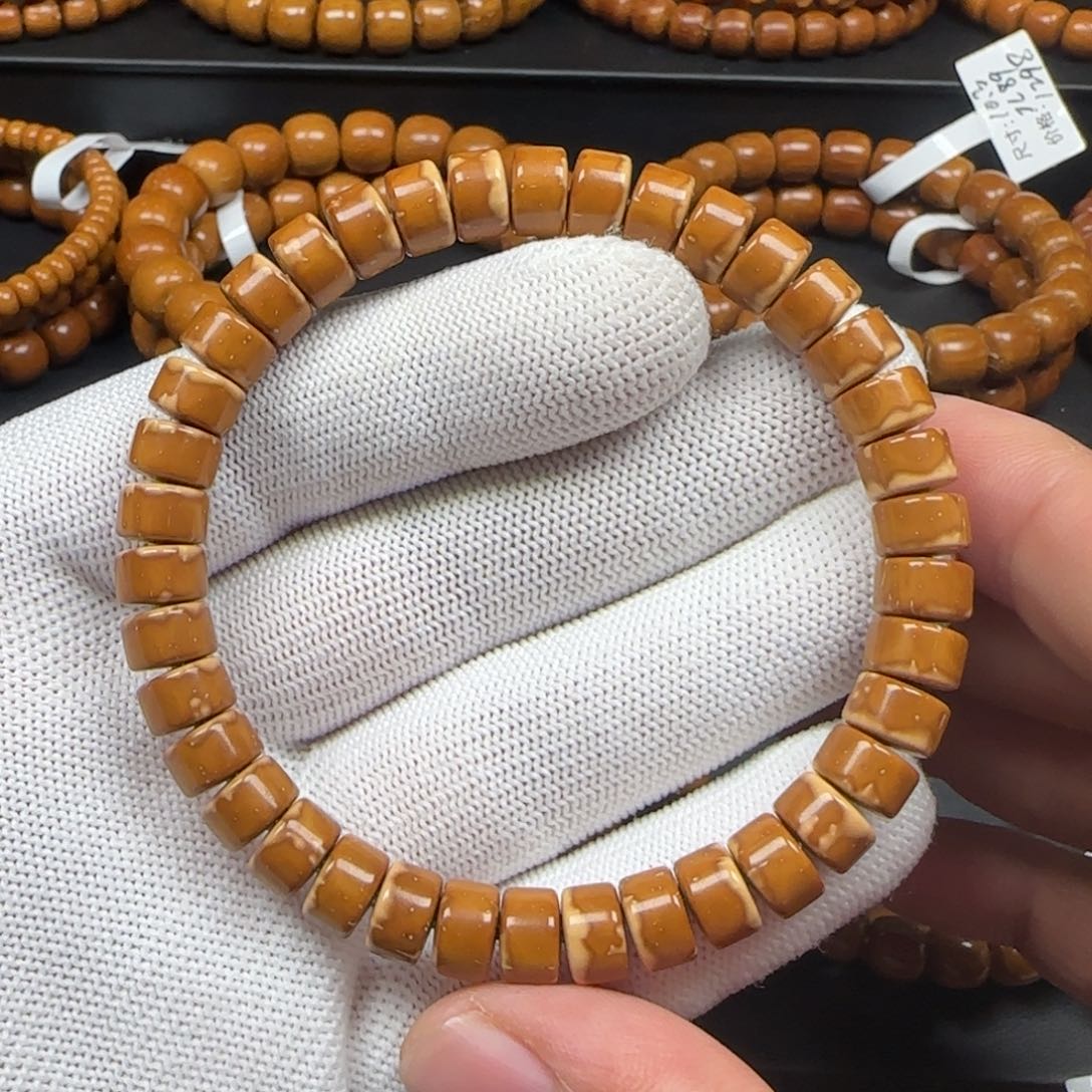 紫金鼠手串8.3*5.3mm纯肉药片（奶盖）