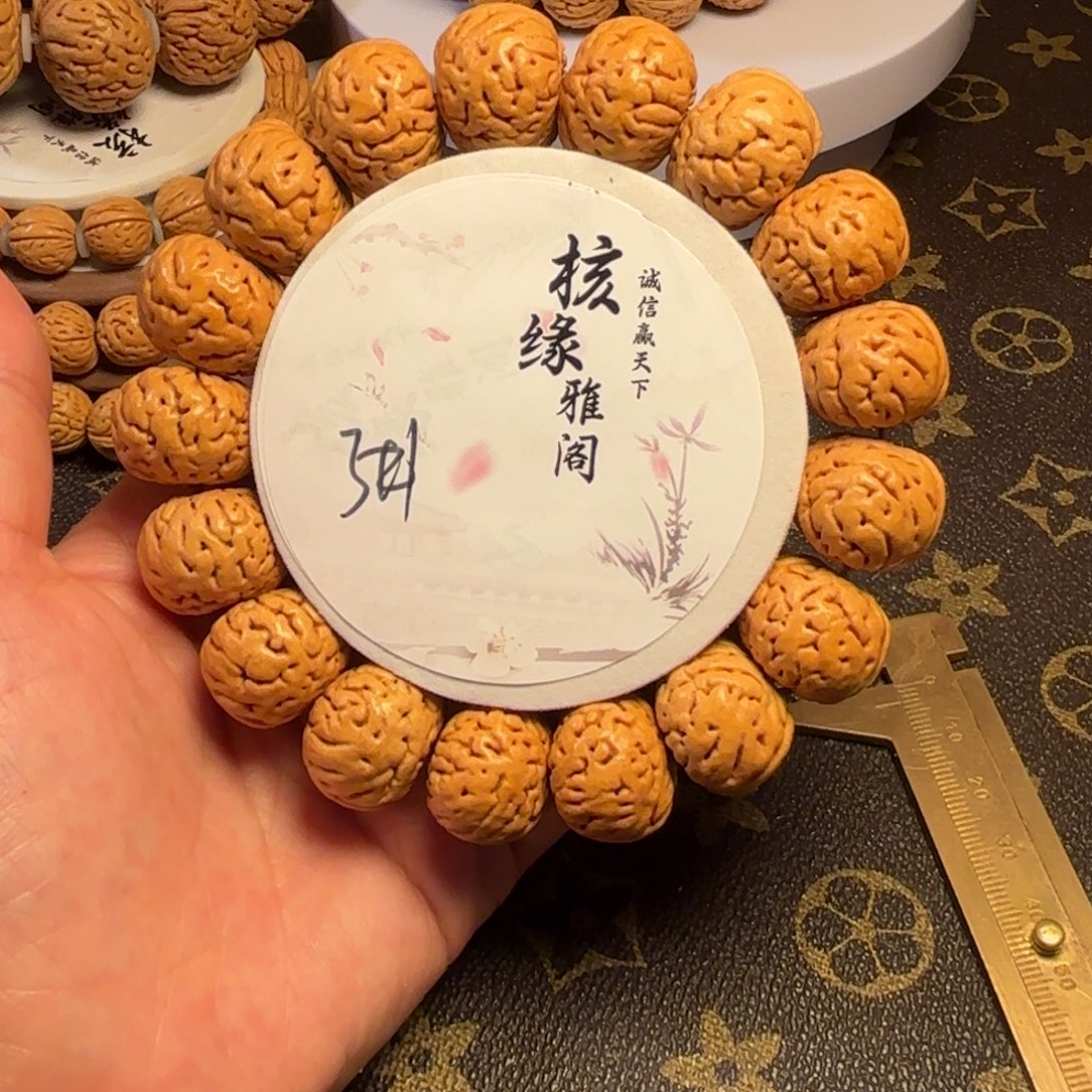 春***来手串桃核纽扣桃核手串