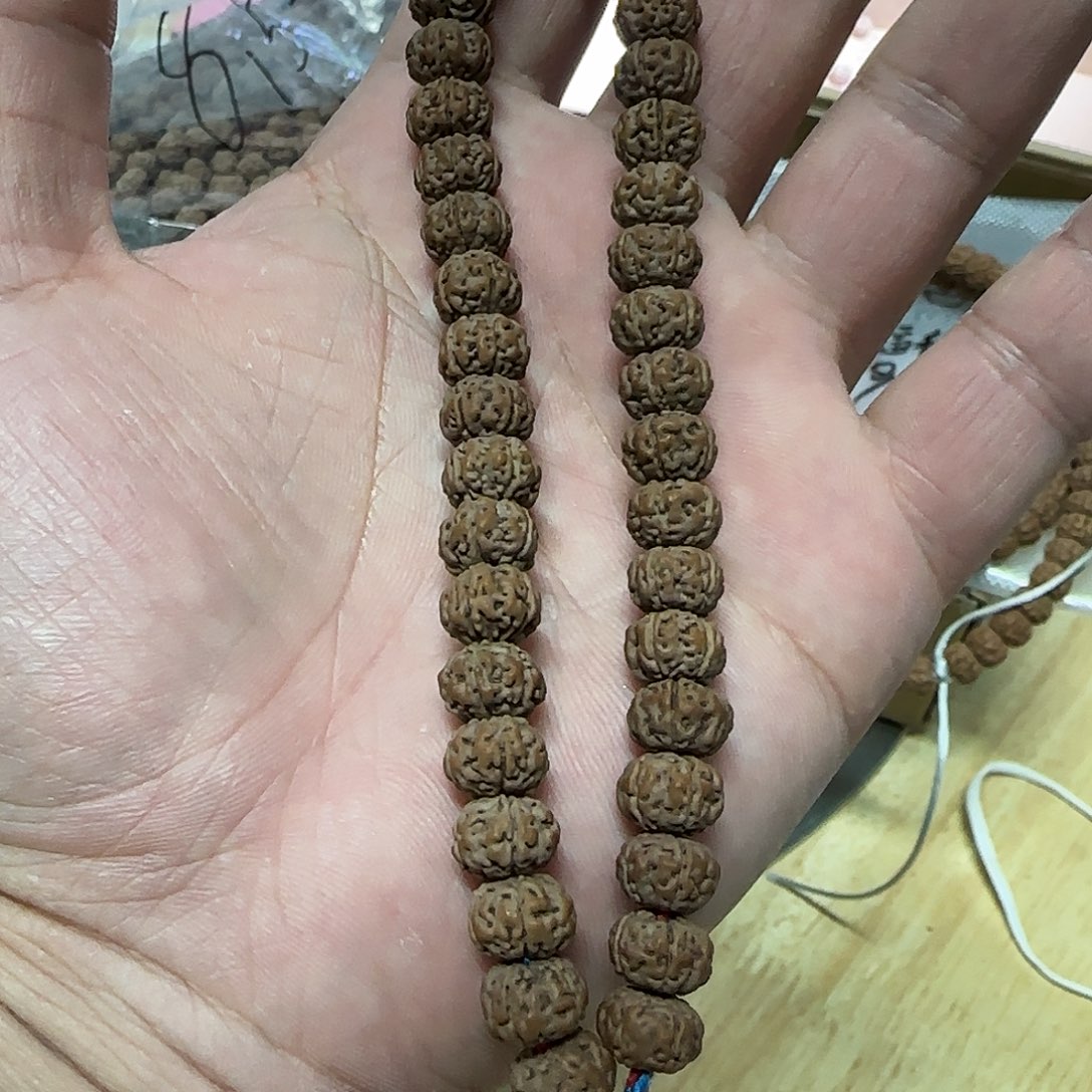 桃核手串老树王手持