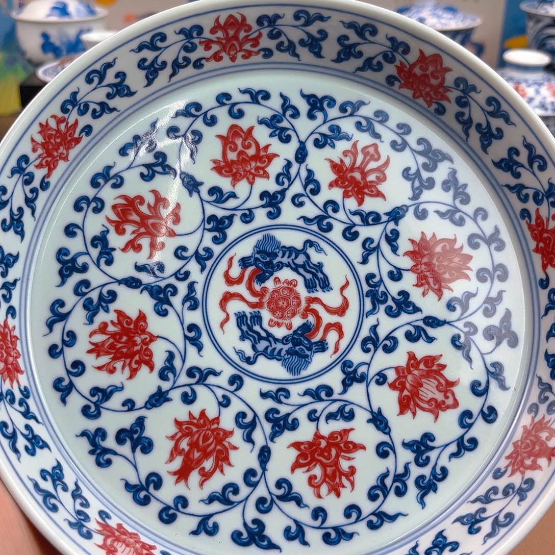 尔**诈釉里红缠枝莲壶承