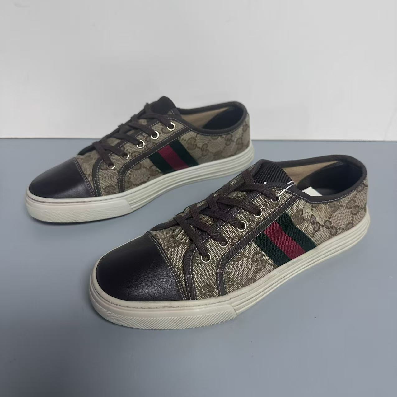 95新 GUCCI/古驰 褐色双G印花时尚男士低帮板鞋 38欧码 lbb1034