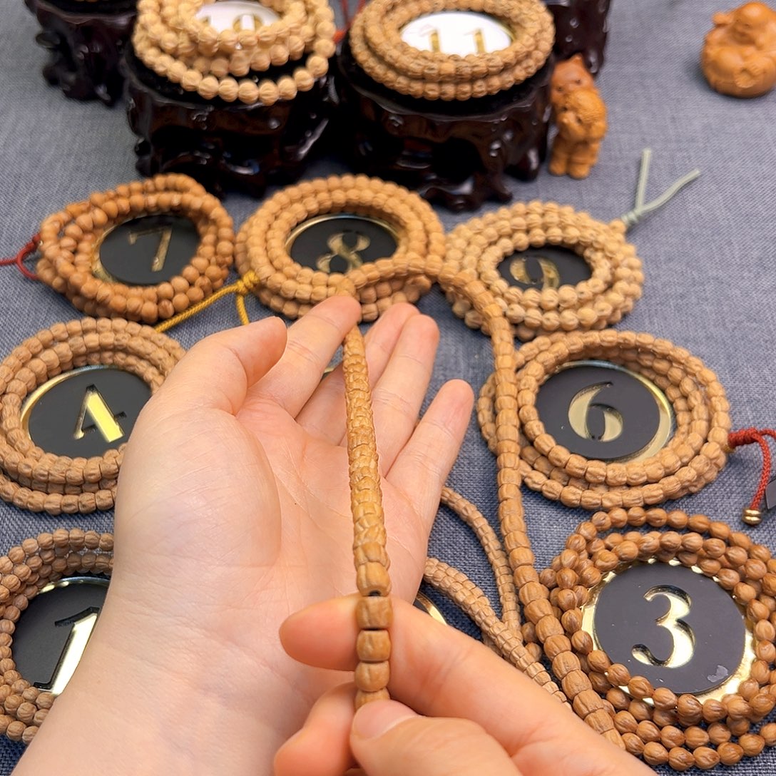 锦***默手串柏香籽/百香籽