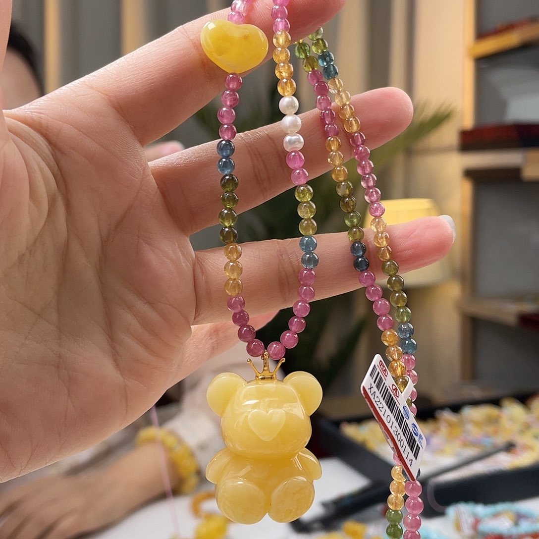 琥珀裸石18K金镶嵌蜜蜡吊坠