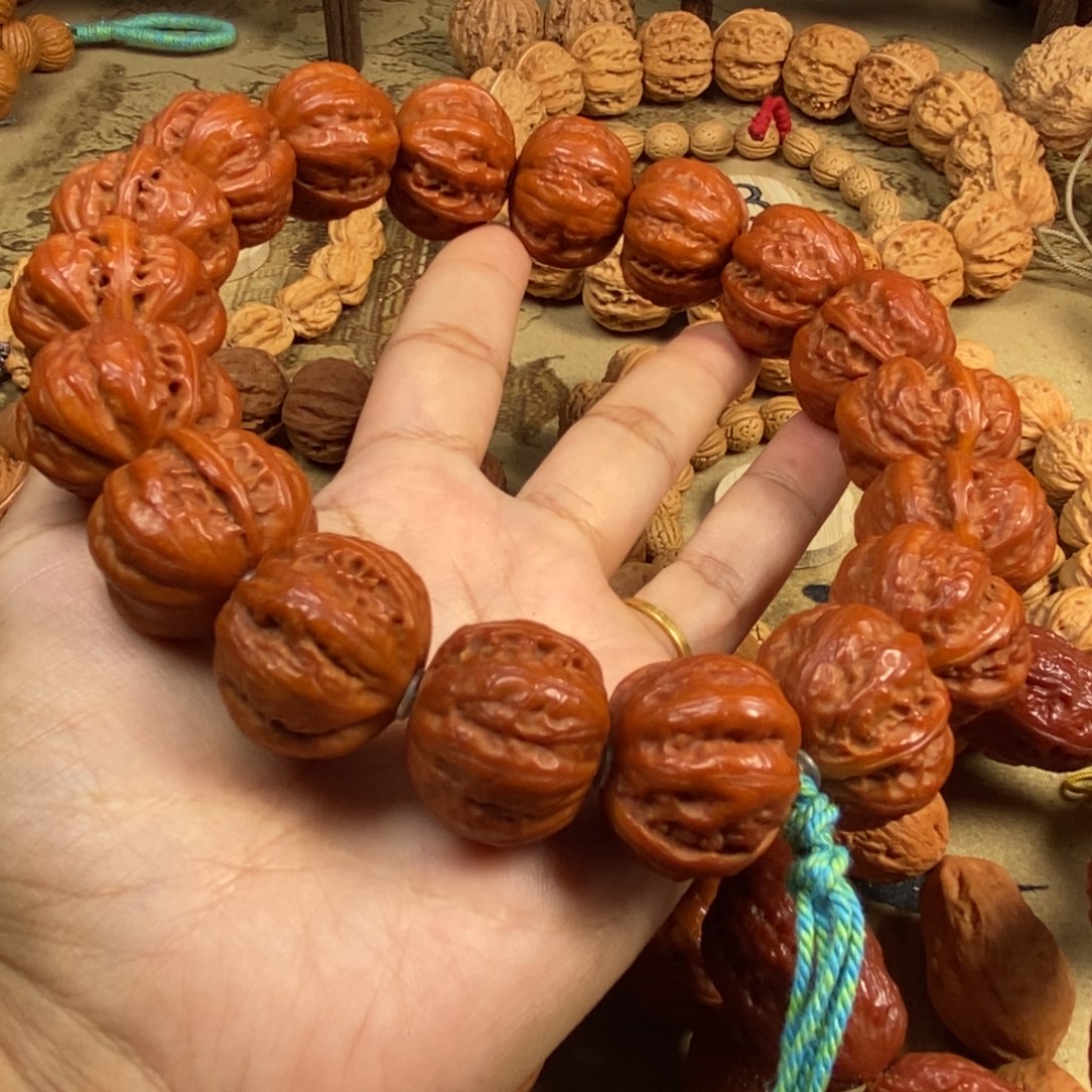 我***导文玩核桃吊坠元宝磨盘文玩核桃