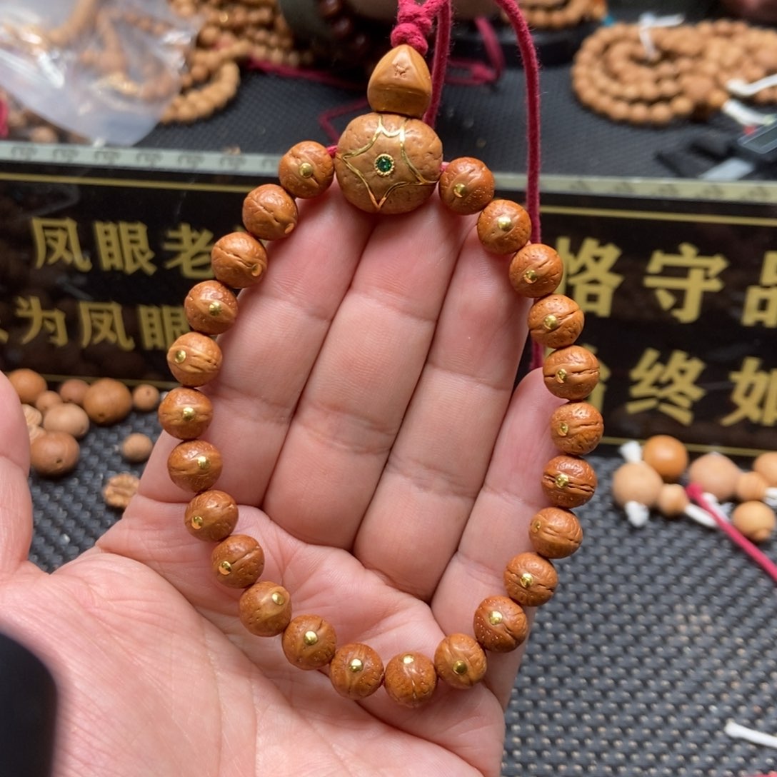 凤眼菩提吊坠9.5金钉手串