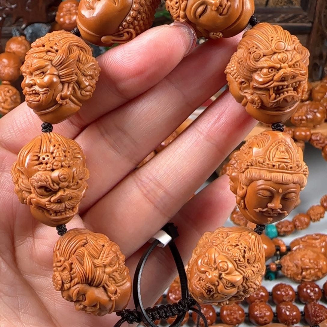 橄榄核手串/手链宽2.1鸡血红梅林核三面万佛朝宗
