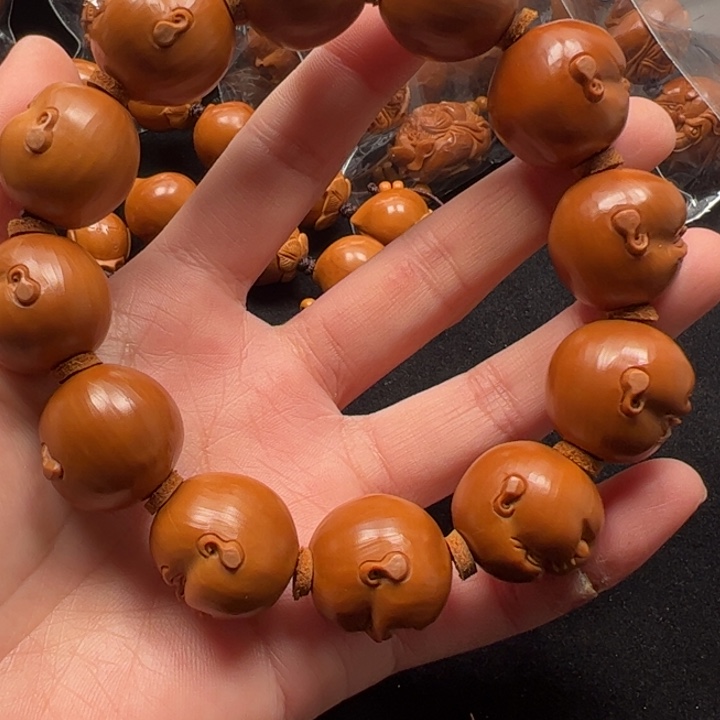 丁***声手串橄榄核21百态