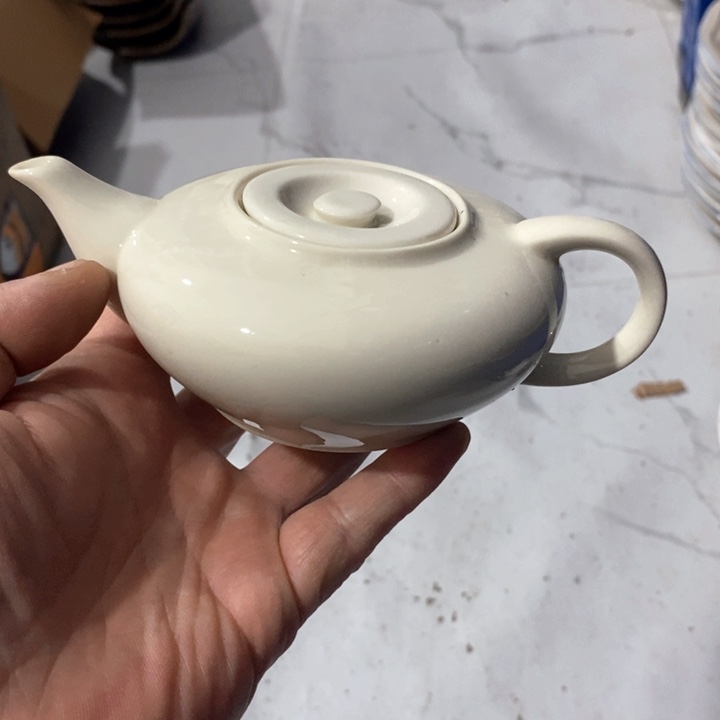 瓷片一物一拍象牙瓷手把壶单孔