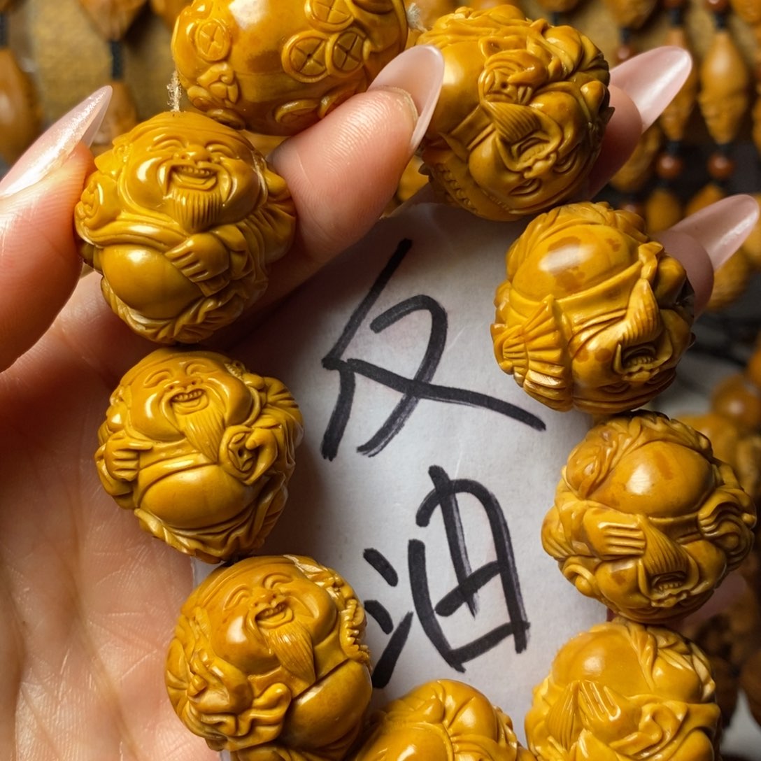 斯***店橄榄核手串/手链八大财神精品