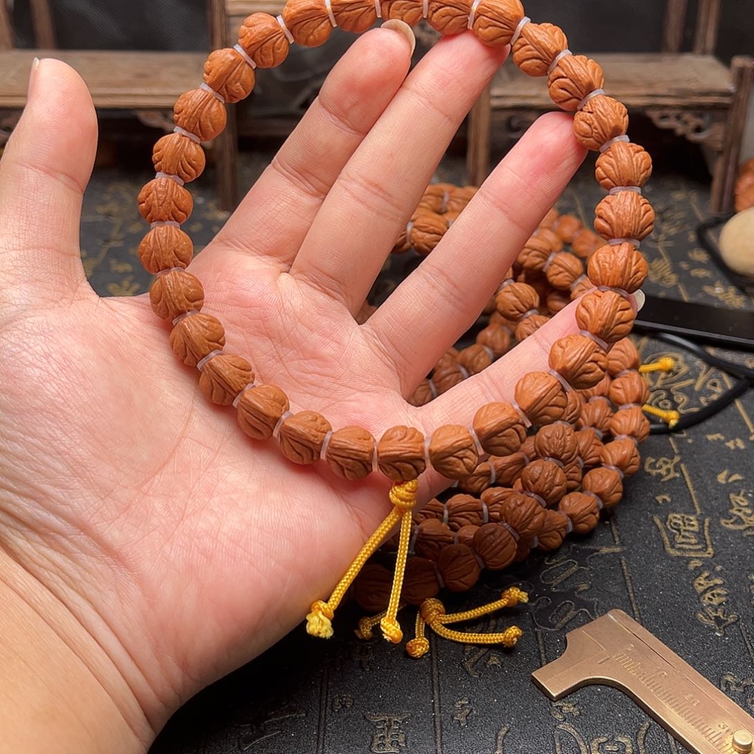 桃核吊坠玉龙手持