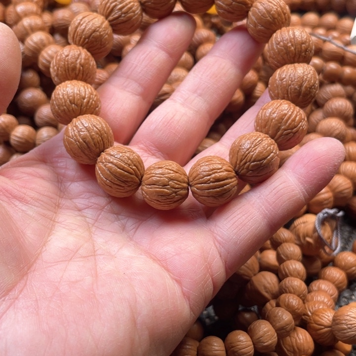 猴头核桃手串1.6水晶风羽