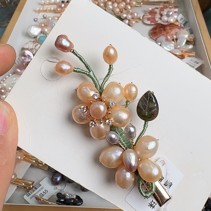 萬***宸未镶嵌淡水珍珠发饰