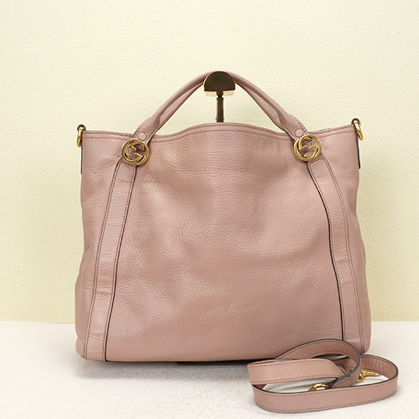 95新 GUCCI/古驰 粉色牛皮金扣手提包